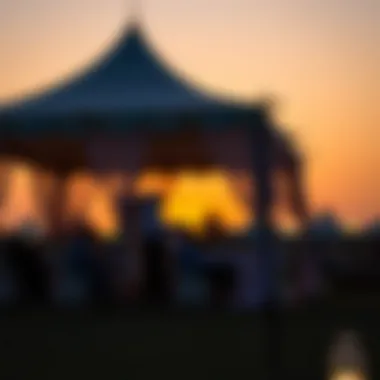Sunset Reflections at Iftar A serene sunset backdrop behind an iftar tent, symbolizing the end of the fasting day.