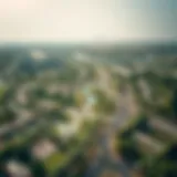 Aerial view of the Green Community showcasing lush greenery and residential areas